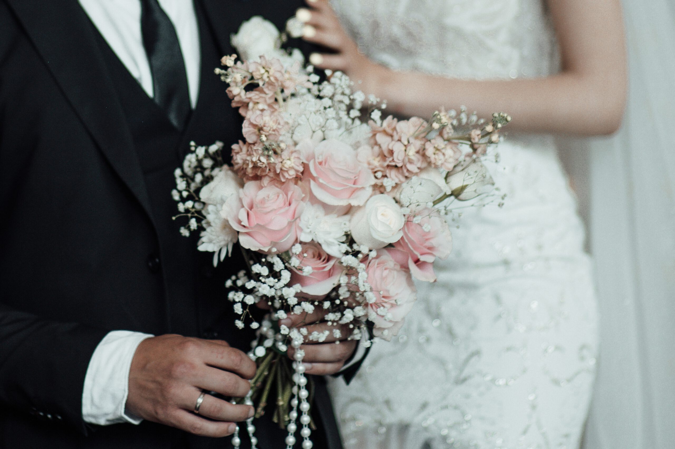 Happy authentic candid couple in love indoor at luxury hotel date in wedding appare